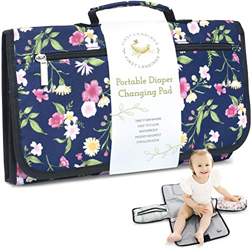 Portable Diaper Changing Pad by First Landings | Convenient, On The Go Baby Change Mat with Head Cushion | Changing Station with Pockets for Diapers and Wipes | Travel Changing Mat for Diaper Bag